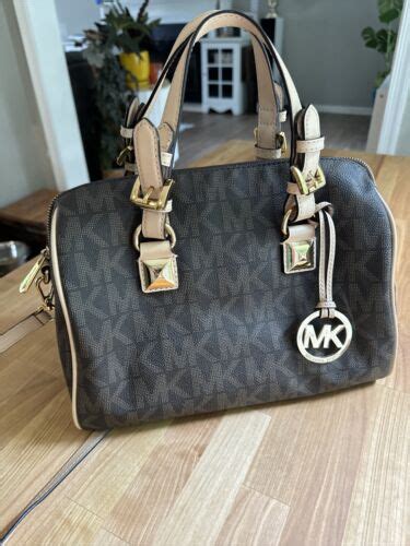 speedy bag michael kors|Michael Kors Brown Leather Speedy Logo Bag .